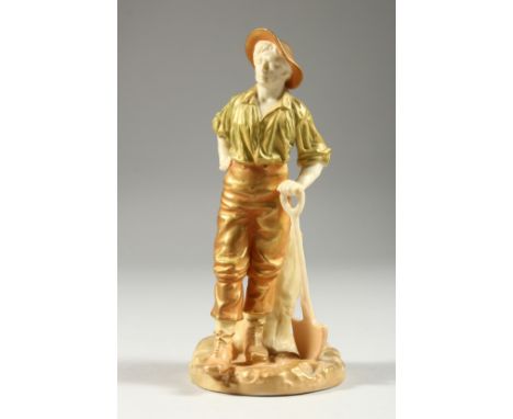 A ROYAL WORCESTER GILDED FIGURE 'THE GARDENER' a young man resting on a spade. Pattern no. 1810, 7ins high. AF