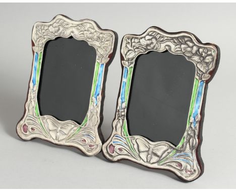  A PAIR OF ART NOUVEAU STYLE SILVER AND ENAMEL PHOTOGRAPH FRAMES with butterflies 3ins x 4.5ins