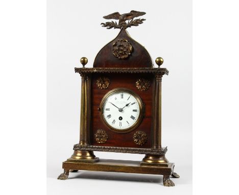 A CHARLES FRODSHAM OF LONDON, No. 20652, MANTLE CLOCK, in a mahogany case with brass motif and eagle, on claw feet. 18ins hig