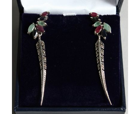 A PAIR OF SLVER, EMERALD, RUBY AND SAPPHIRE FEATHER DESIGN EAR RINGS