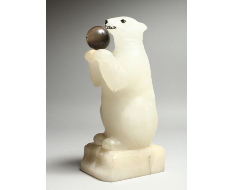 AN ONYX POLAR BEAR LAMP on a square base.