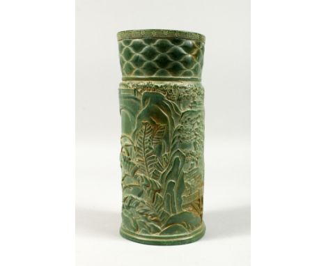 A LARGE CHINESE CARVED BAMBOO JADE VASE, carved with foliage and fences.