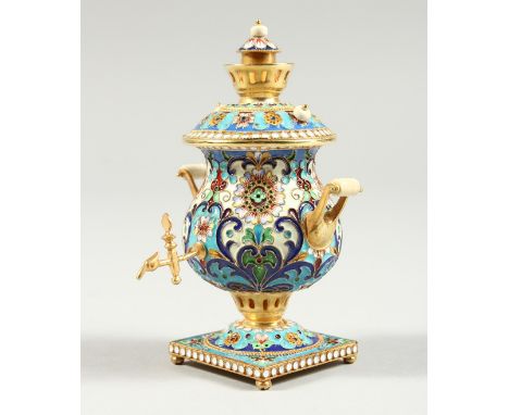  A GOOD SMALL RUSSIAN SILVER GILT AND CHAMPLEVE ENAMEL MINIATURE SAMOVAR, stamped 84 4ins high.