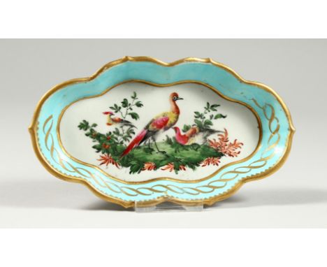 A WORCEASTER SPOON TRAY, painted with birds under a turquoise and gilt border (gilding worn).