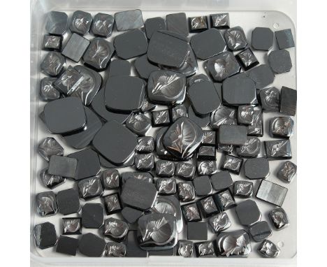A BOX OF INTAGLIO STONES.