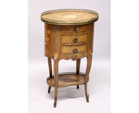 A GOOD 19TH CENTURY FRENCH OVAL THREE DRAWER COMMODE, with brass grill and marquetry inlay on curing legs and under tier. 2ft