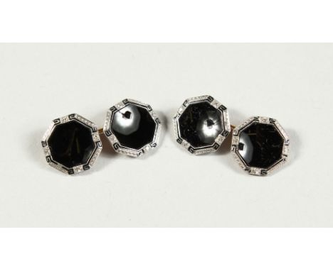 A GOOD PAIR OF GOLD AND BLACK ENAMEL DIAMOND GILT CUFF LINKS