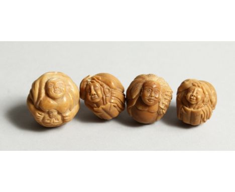 A SET OF FOUR CARVED BONE NETSUKE