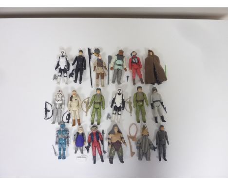 Eighteen Star Wars figures including Nikto, B-Wing Pilot, Luke Skywalker (Jedi Outfit), Princess Leia (Boush disguise) AT-AT 