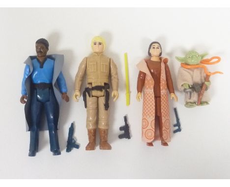 Four Star Wars figures including Luke Skywalker Bespin Fatigues, Lando Calrissian, Princess Leia with Bespin Gown, Yoda. (4)
