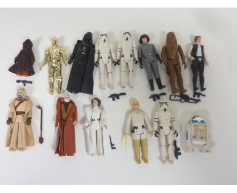 Fourteen Star Wars figures including eleven of the first twelve, 1977, C-3PO, Obi-Wan with retractable light sabre, Han Solo,