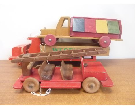 Three vintage wooden pull along toy vehicles including Wegenbouw wagon, fire truck and a delivery truck.  (all in need of att