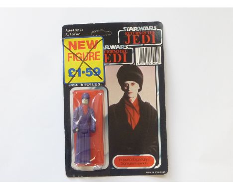 1983 Palitoy / German Milla Ltd. Star Wars Tri-Logo Imperial Dignitary, in bubble on card, crossed out yellow price sticker.