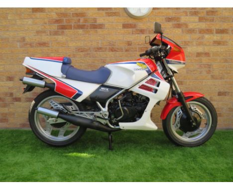 Water-cooled 250cc two-stroke triple Honda sports bike.Marketed in Japan and New Zealand as a race-bred, two-stroke, three-cy