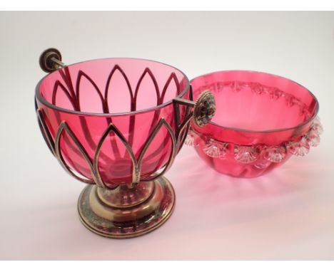 Two items of cranberry glass including sugar bowl 