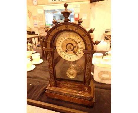 Antique dark wood break arch mantel / alarm clock with gilded inlay and decorative finials with key CONDITION REPORT: This it