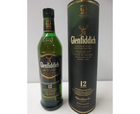 Boxed Bottle of 12 Year Glennfiddich Single Malt Scotch Whisky.