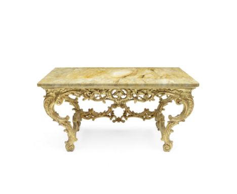 A carved giltwood console tableItalian, 18th centuryThe later Sienna marble top above a pierced and acanthus foliate scroll f