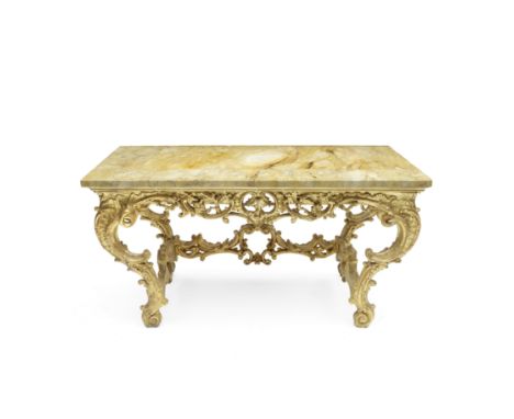 A carved giltwood console tableItalian, 18th centuryThe later Sienna marble top above a pierced and acanthus foliate scroll f