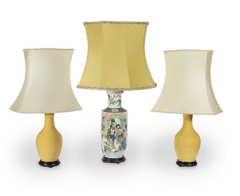 A collection of three ceramic lamp basesIncluding a pair of yellow glazed baluster vases adapted to lamp bases,  18cm wide x 