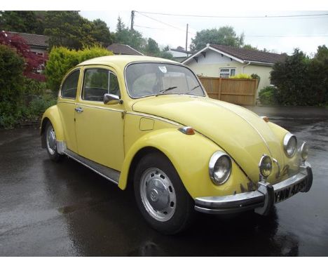 A 1972 Volkswagen Beetle 1300, registration number YMW 423K, yellow. This 1300 Beetle has been owned by the vendor since 1977