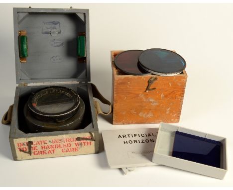 A WWII Ex WD Type P8 compass in its original wooden box, with examination marks for 1943 and 1944, together with two Aldiss l