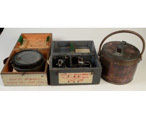A  WWII RAF P10 compass and an astro compass MK II, together with associated paperwork and a copper lidded pot with an iron s