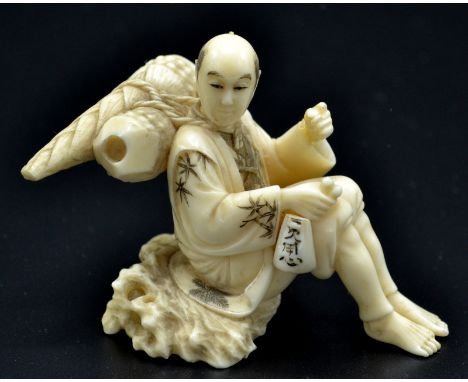 A Japanese ivory okimono, a farmer seated upon a rock and resting from gathering bamboo shoots that are tied to his back, in 