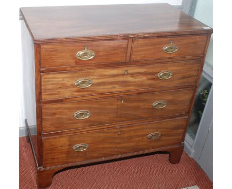 A George III mahogany chest of small proportions fitted two short and three long graduated drawers on bracket feet, width 92c
