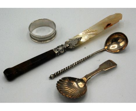 A Russian silver lemon tea spoon, the back of the bowl engraved, the stem spiral fluted, together with a paper knife with aga