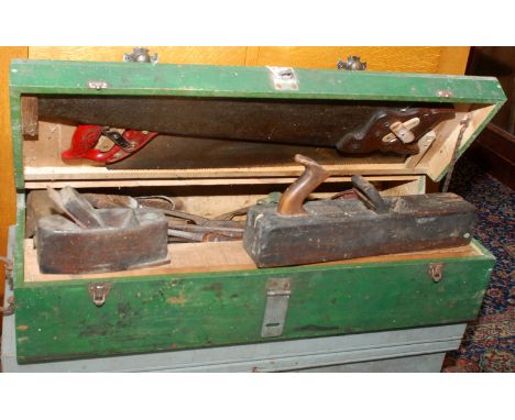 A carpenter's pine tool chest and contents, including saws, planes and a breast drill.