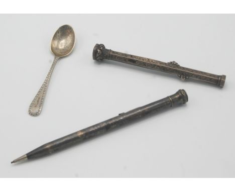 An engraved silver propelled pen and pencil with seal finial and one other propelling silver pencil.