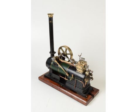 A fine engineer made, scratch built, single cylinder static steam engine on a rectangular hardwood base, works fully on compr