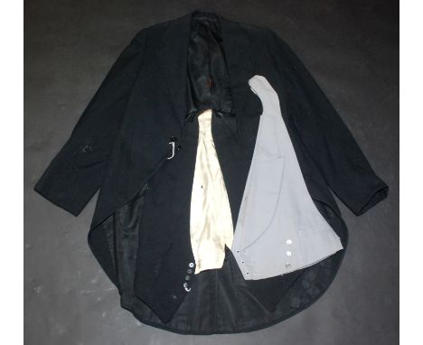 An Austin Reed of Regent Street London, grey Marcella adjustable waistcoat size 36, a pair of striped trousers with Austin Re