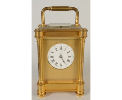 A good French Richard & Cie repeating carriage clock in a matte gilt four pillar case, with silver plater lever escapement, t