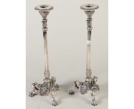 A pair of Elkington tripod candlesticks, each with an acanthus cast nozzle on a fruited column raised on three hoofed feet wi