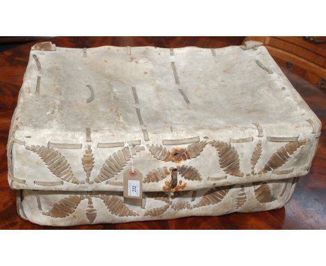 An African rectangular hide trunk with a woven design. Width 60cm.