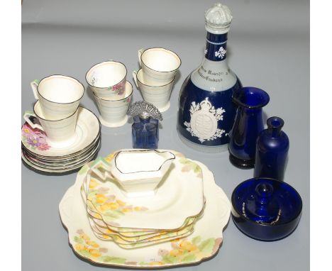Six 1930s New Chelsea floral painted coffee cups and saucers, a Grafton sandwich plate, a Copeland Late Spode 1911 commemorat