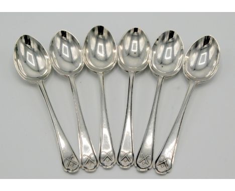 Six golfing finial silver coffee spoons.