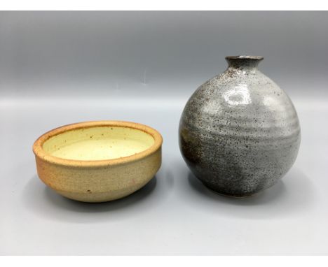 Winchombe Pottery a small stoneware bowl, diameter 10.5cm, impressed mark, together with a Michael Leach "Yelland Manor" Pott