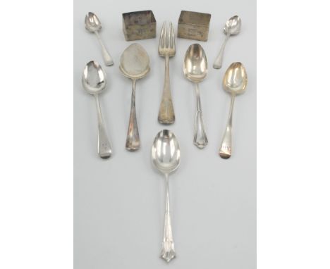 Seven various silver spoons and three forks, together with two engine turned silver napkin rings. 