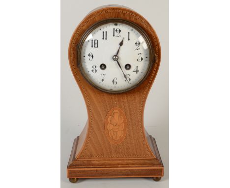 A late 19th century balloon mantel clock in an inlaid, waisted mahogany case, the white enamel dial with gothic numerals, Fre