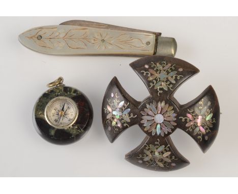 A pique brooch, a serpentine compass fob and a fruit knife with folding silver blade.