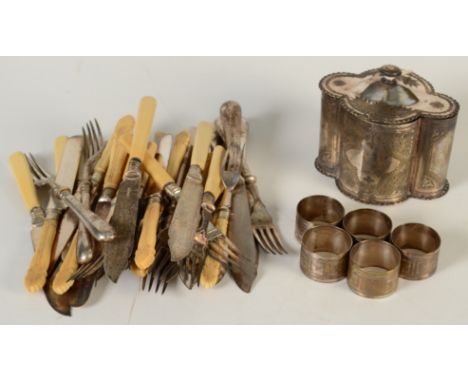 A quatrefoil tea caddy, cutlery and five napkin rings.