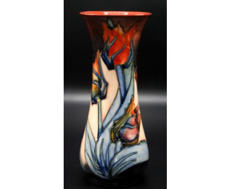 A Moorcroft Pottery 'Red Tulip' pattern slender vase with everted rim, brown Moorcroft mark and arrow year mark 1990, green W