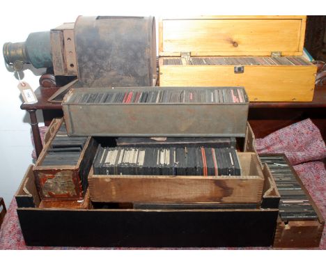 A magic lantern and a large collection of slides in ten boxes.