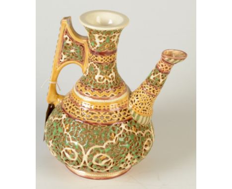 A Zsolnay Pecs reticulated ewer, printed and impressed marks to base, height 24cm.    Condition report:  Gilding rubbed in pl