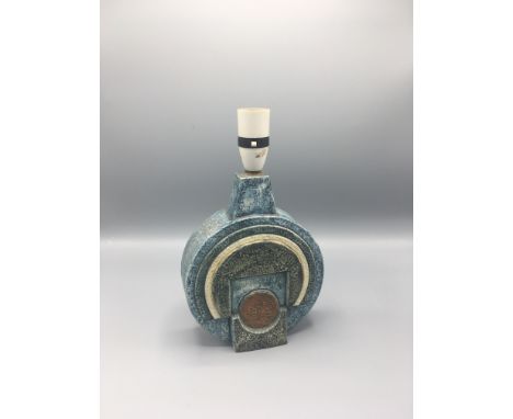 Troika a wheel table lamp  with a geometric design, height 20cm, decorators mark of Penny Black   Condition report:  Two smal