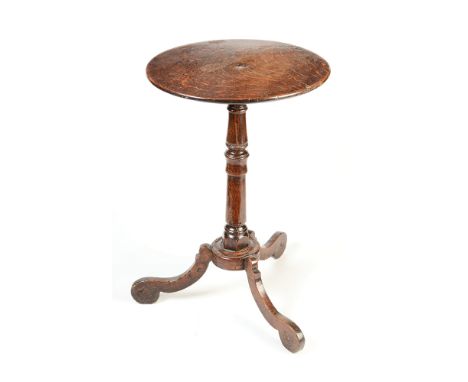 A late 17th or early 18th century oak tripod table, diameter 37cm, height 58cm. (See illustration)   Condition report:  Legs 