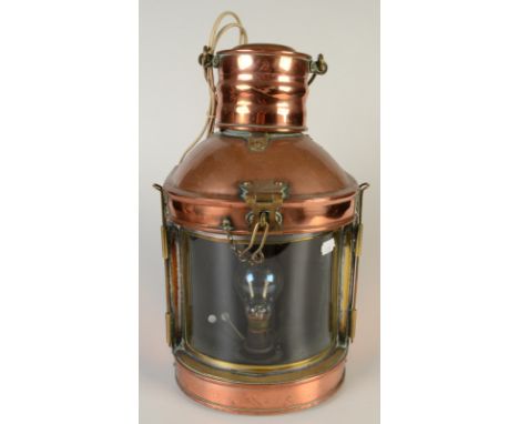 A ship's copper lamp, height 38cm.